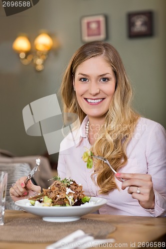 Image of Young Woman With Plate Of Meat Salad