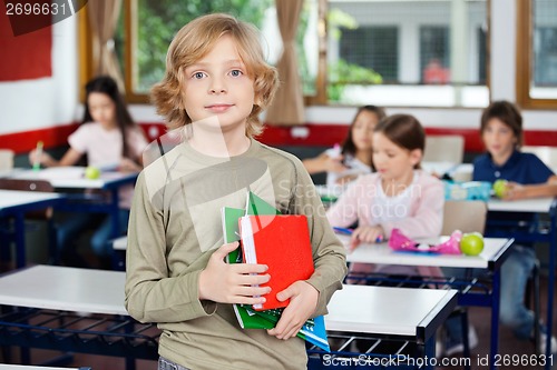 Image of Schoolboy Holding Books