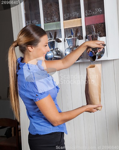 Image of Female Customer Buying Coffee From Vending Machine