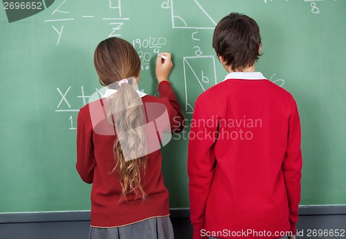 Image of Students at blackboard