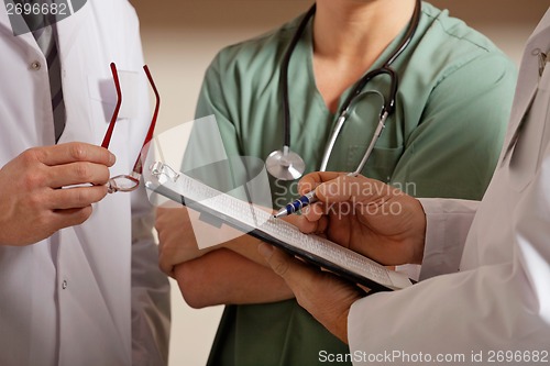 Image of Doctor Standing With Colleagues