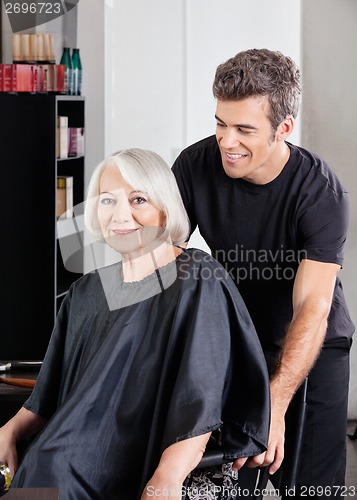 Image of Client With Hairstylist Standing Behind