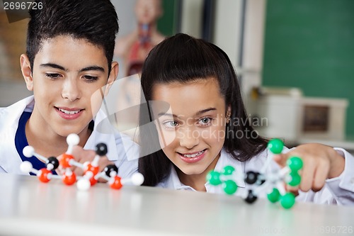 Image of Schoolchildren Examining Molecular Structures