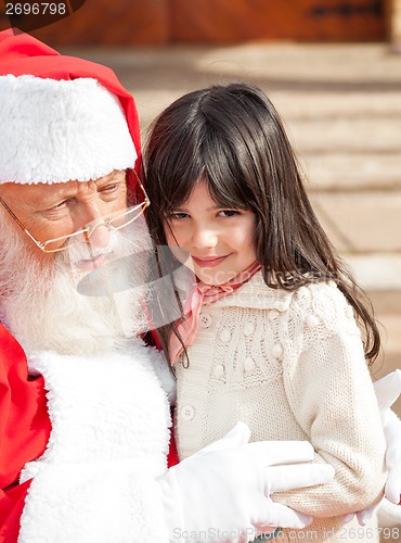 Image of Cute Girl With Santa Claus