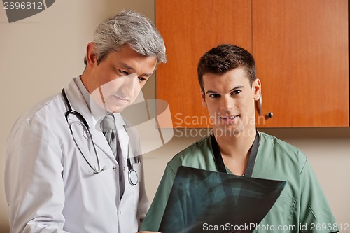 Image of Male Technician With Radiologist