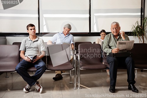 Image of People Waiting In Hospital Lobby