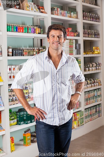 Image of Man Standing In Supermarket