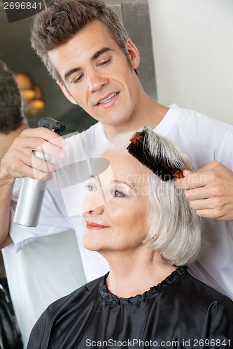 Image of Hairdresser Setting Up Client's Hair