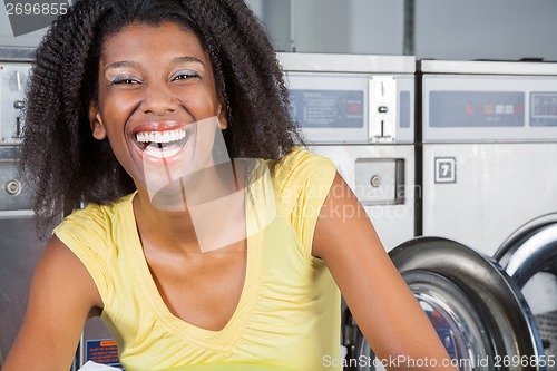 Image of Cheerful Woman In Laundry
