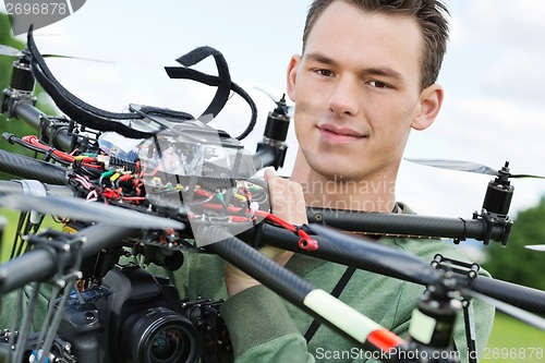 Image of Engineer Holding UAV Octocopter