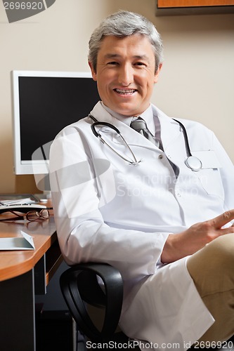 Image of Happy Doctor In Clinic