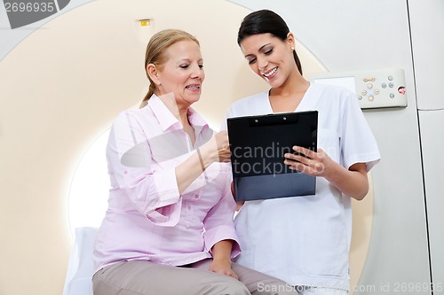 Image of Nurse With Female Patient