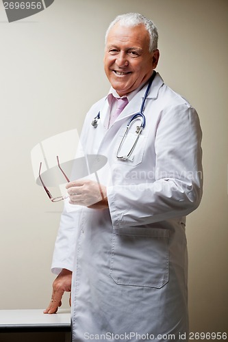 Image of Senior Male Doctor Smiling