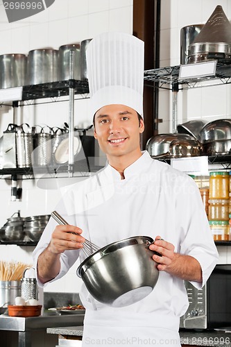 Image of Young Chef With Wire Whisk And Mixing Bowl