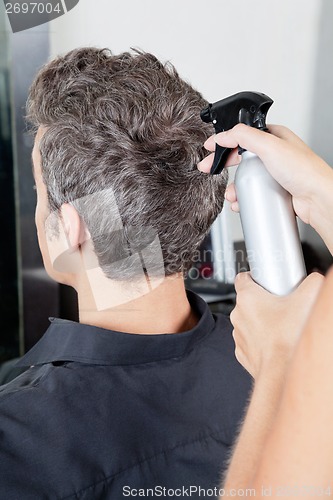 Image of Man Getting Haircut In Salon