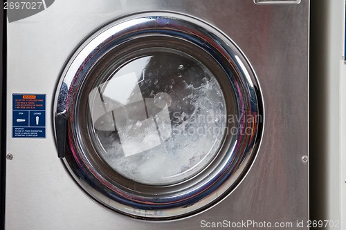 Image of Water Spinning In Washing Machine