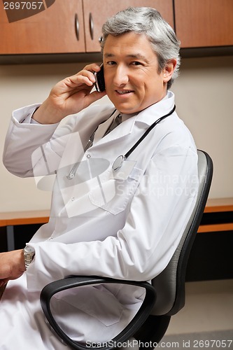 Image of Doctor Answering Phone Call