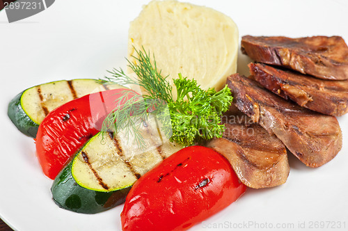 Image of tongue with grilled vegetable