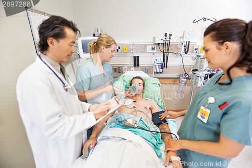 Image of Medical Team Treating Critical Patient