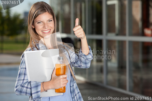 Image of College Student Giving Thumbs Up