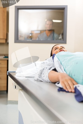 Image of Patient Getting Xray In Examination Room