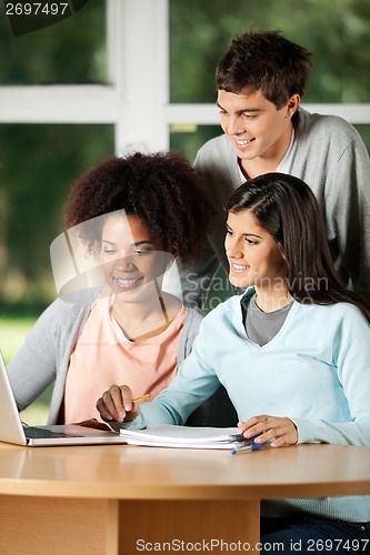 Image of Students With Laptop Studying At Desk In Classroom