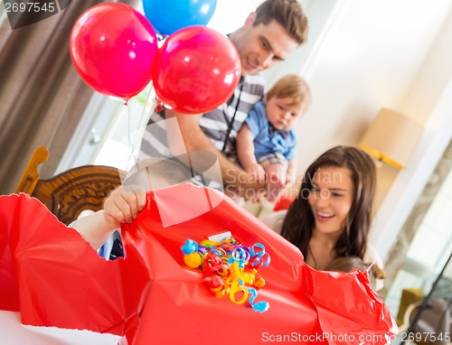 Image of Birthday Boy Opening Gift Box