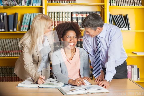 Image of Student With Teachers In University Library