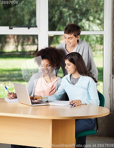 Image of Students With Laptop Studying Together In Classroom