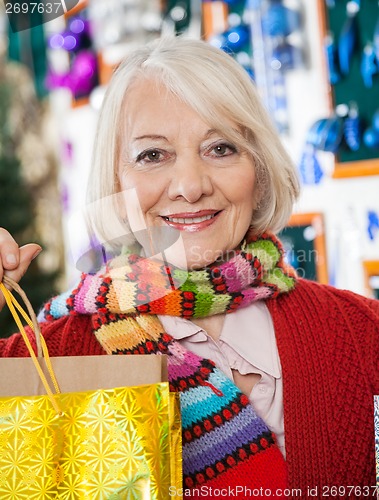 Image of Beautiful Woman Carrying Shopping Bags At Store