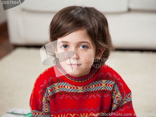 Image of Boy Wearing Red Sweater During Christmas