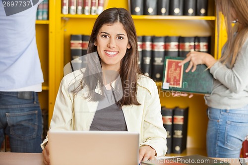Image of Happy Woman With Laptop At University Library