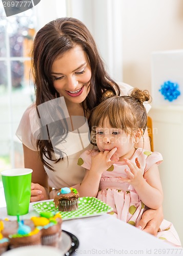 Image of Mother With Birthday Girl At Home