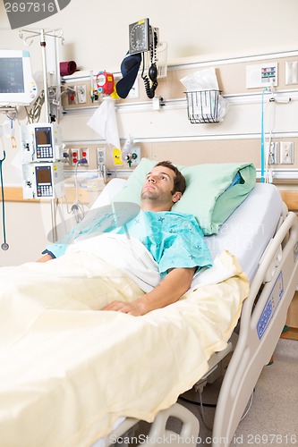 Image of Male Patient Resting On Bed