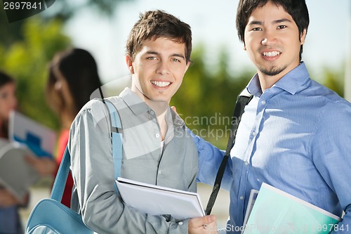 Image of Male Friends Smiling On College Campus