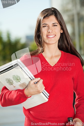 Image of Happy Student With Books Standing On Campus