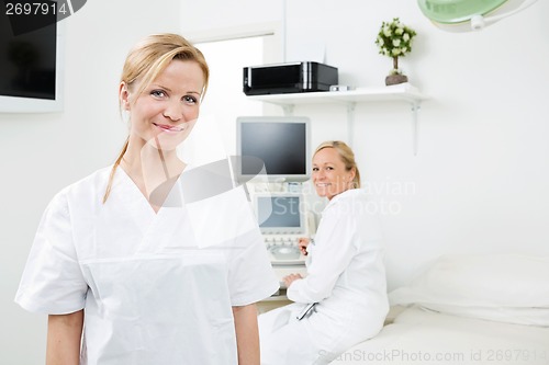 Image of Happy Female Gynecologists In Clinic