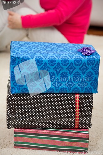 Image of Closeup Of Christmas Presents On Floor