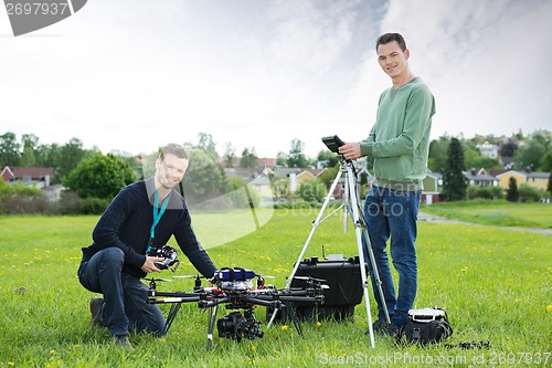 Image of Technicians Working On UAV Helicopter