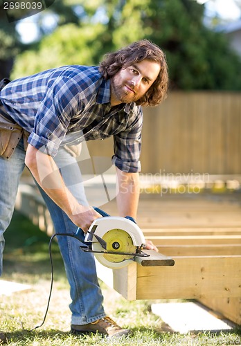 Image of Carpenter Using Circular Saw