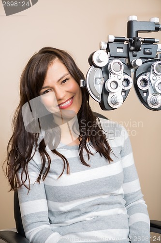 Image of Happy Woman Having Eye Exam