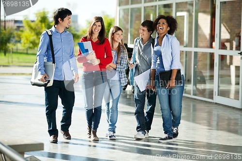 Image of Cheerful Students Walking On Campus