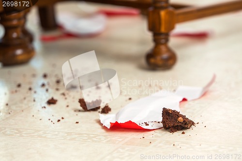 Image of Pieces Of Cake On Floor