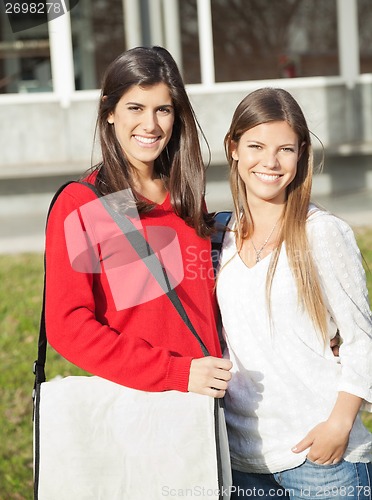 Image of Beautiful Friends Smiling Together On University Campus