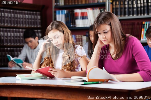 Image of Friends Studying Together At Table