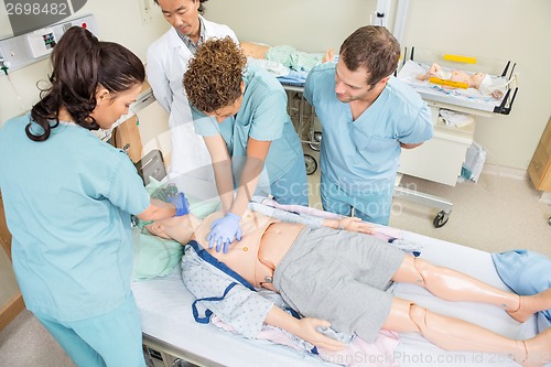 Image of Nurses Performing CPR On Dummy Patient