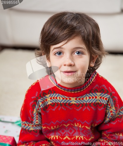 Image of Cute Boy Wearing Sweater During Christmas
