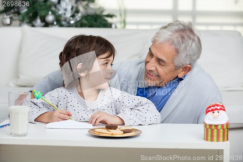 Image of Boy And Grandfather Writing Letter To Santa Claus