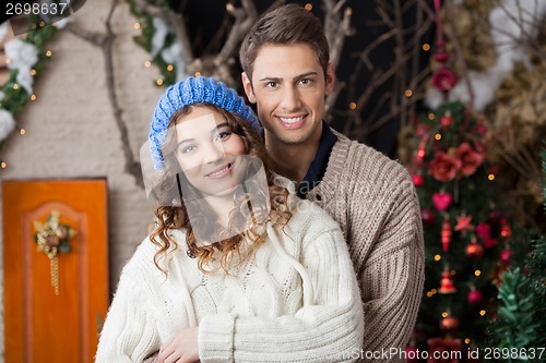 Image of Happy Couple In Christmas Store