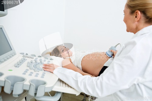 Image of Doctor Performing An Ultrasound Scan